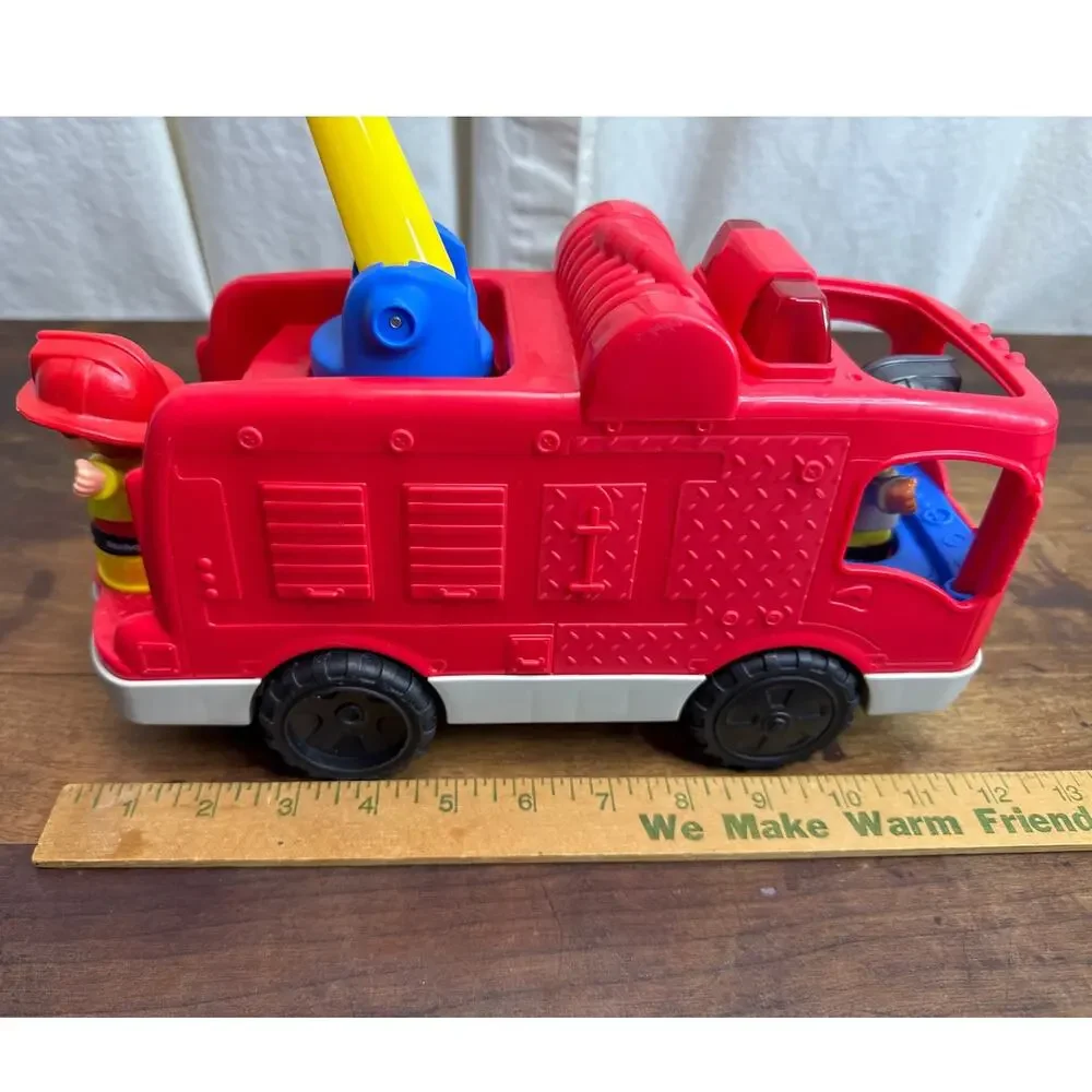 Fisher-Price Little People Helping Others Fire Truck & Figures 2016 Musical Toy
